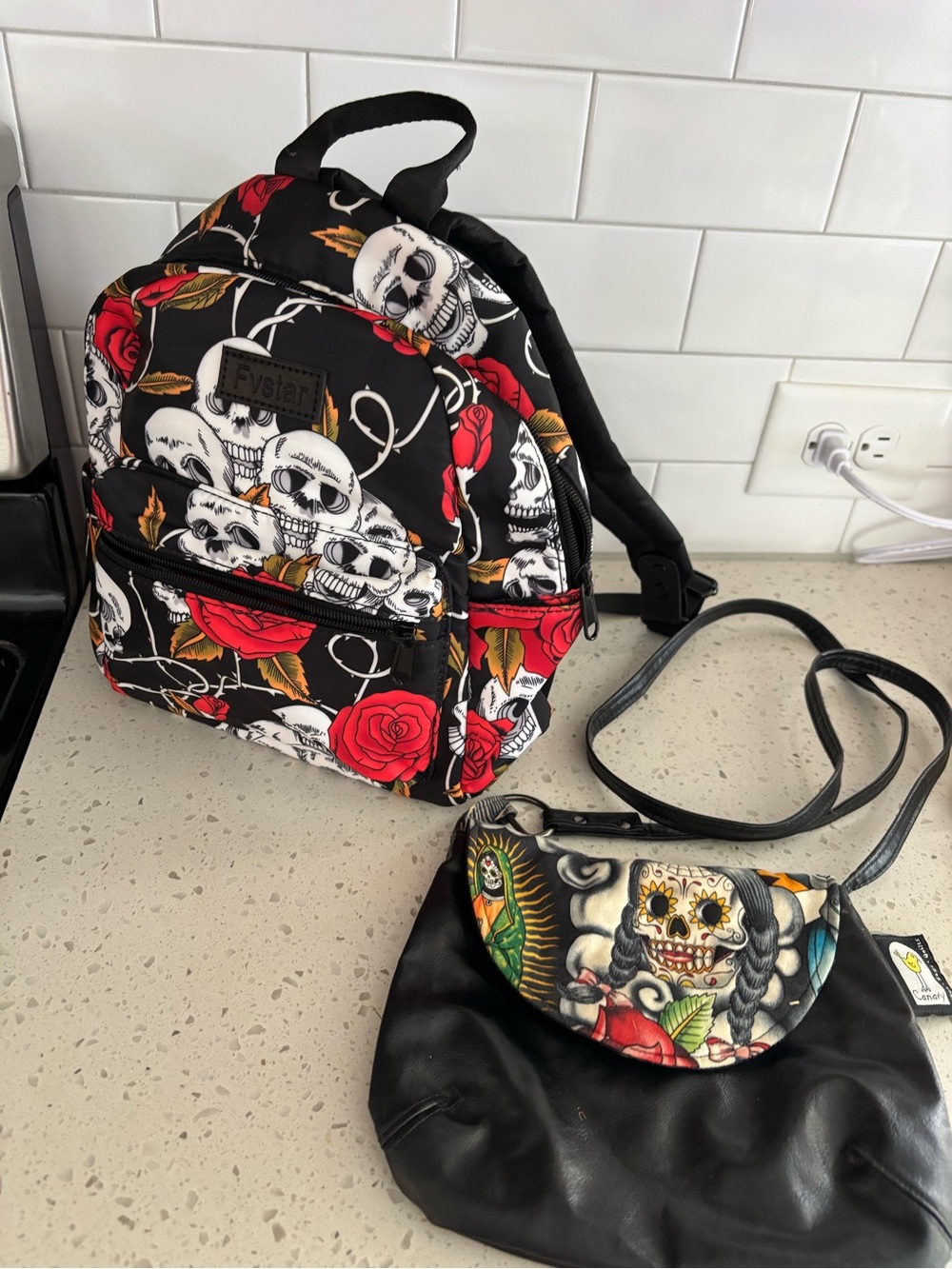 Skull & Red Rose Mini Backpack by Fyldan and small crossbody bag by Canary